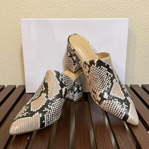 Nine West mule heels, size wm 8.5, black white and cream colored